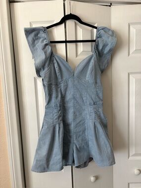 Modenaire STRUCTURED ZIP FRONT ROMPER WITH FLUTTER SLEEVES AND PLEATED $135 S